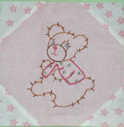 Flannel Baby Quilt with Hand Embroidered Squares