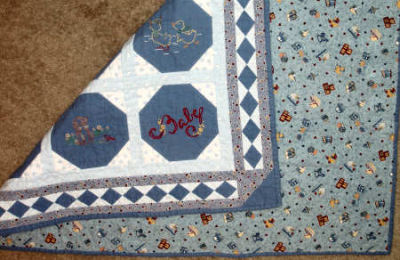 Embroidered Baby Quilt in flannel - back