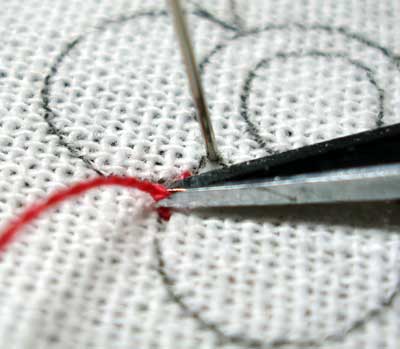 How to begin your embroidery thread: using anchor stitches on a line