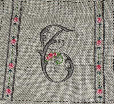 Embroidered needlebook progress - repaired monogram