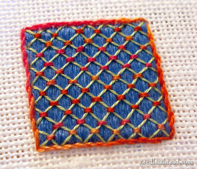 Lattice work over satin stitch