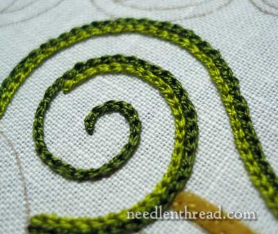 Jacobean Jumble embroidery project: chain stitch swirl worked in silk