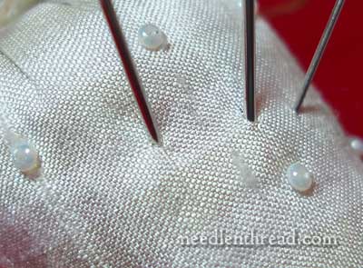 Buy your Sewing needle large with two holes silver 2 eyes online