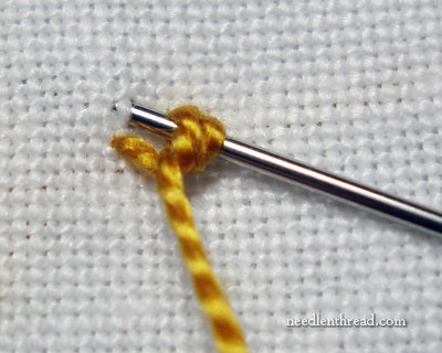 French knot vs. colonial knot