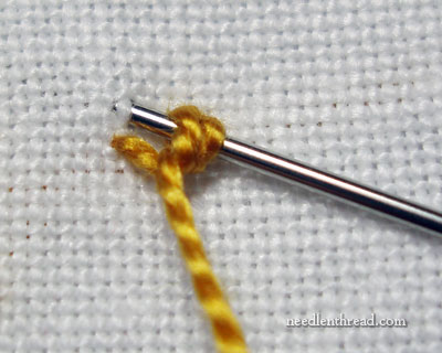 French knot vs. colonial knot