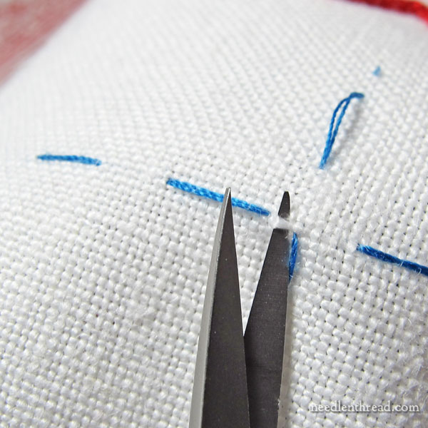 Hungarian Redwork Runner - preparing for a drawn thread hem
