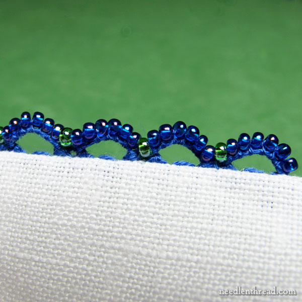 Scalloped & beaded buttonhole stitch edging using seed beads