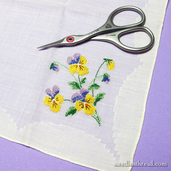 Hand embroidered vintage handkerchief with violas in tent stitch
