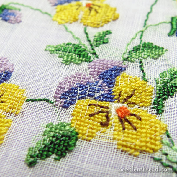 Hand embroidered vintage handkerchief with violas in tent stitch