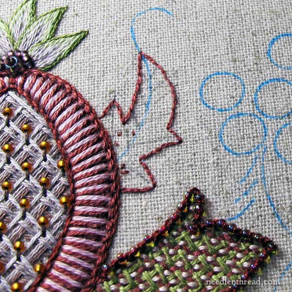 Beaded Palestrina stitch outlines around leaves