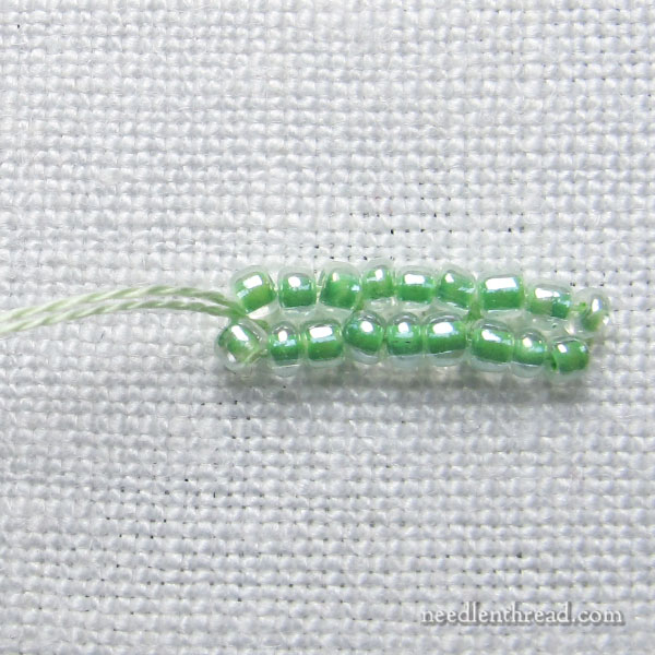 flat chain stitch line worked with beads