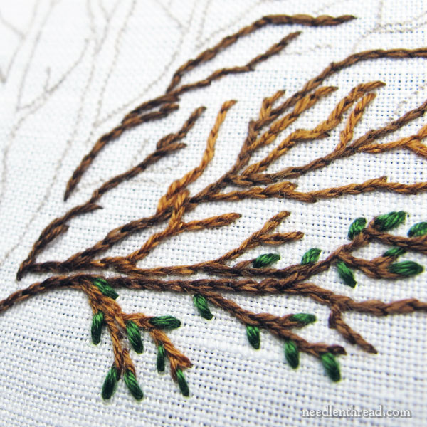 Embroidered tree worked with split stitch