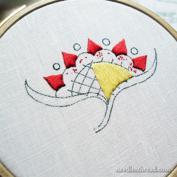 Embroidery with satin stitch and floche