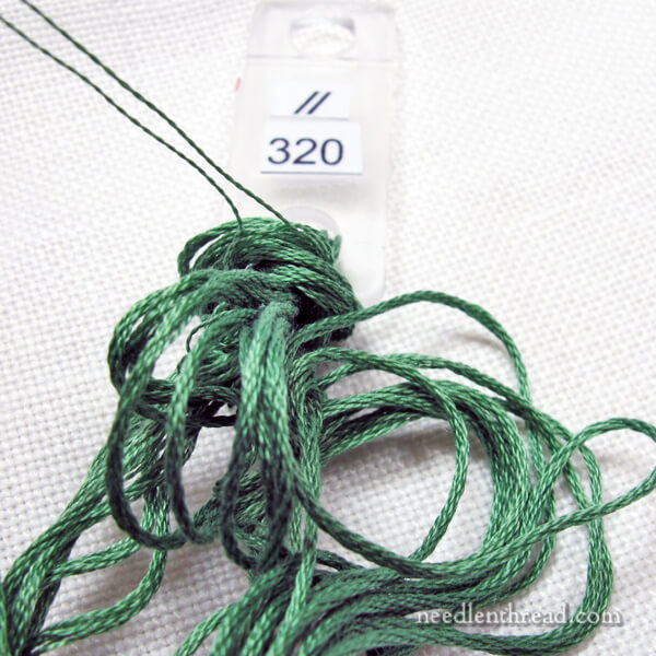 Separating one strand of embroidery floss at a time