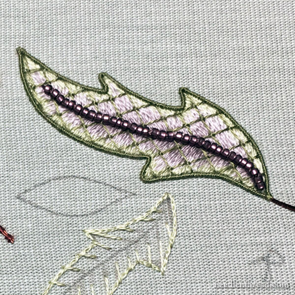 Stumpwork embroidery - leaf in long and short stitch with lattice and beads