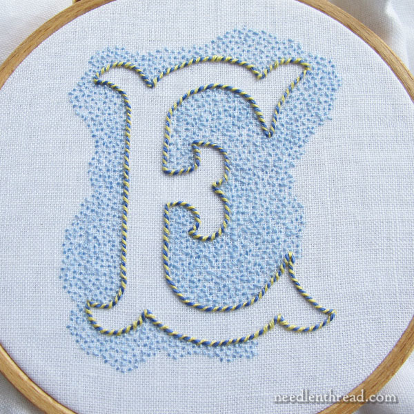 Voided E Monogram in Blue & Yellow