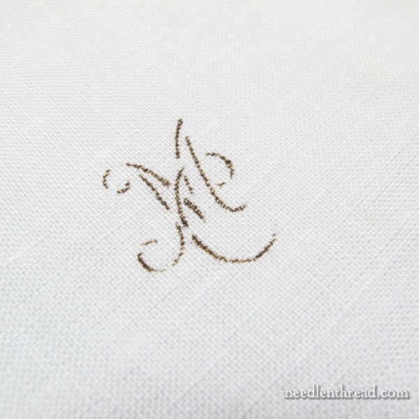 Transferring monogram stencils to fabric using pens and pencils