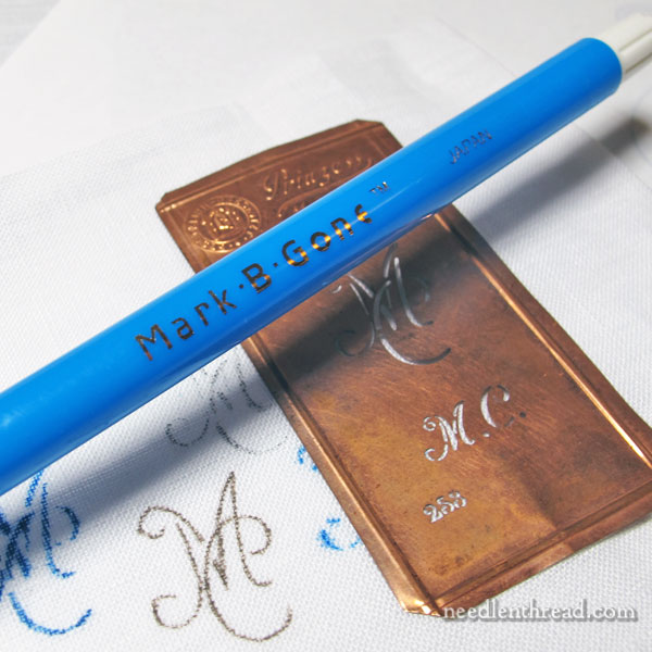 Transferring monogram stencils to fabric using pens and pencils