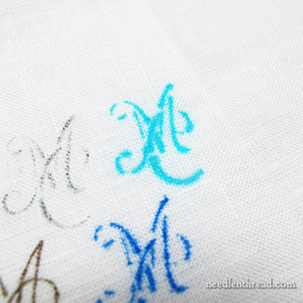 Transferring monogram stencils to fabric using pens and pencils