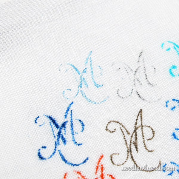 Transferring monogram stencils to fabric using pens and pencils