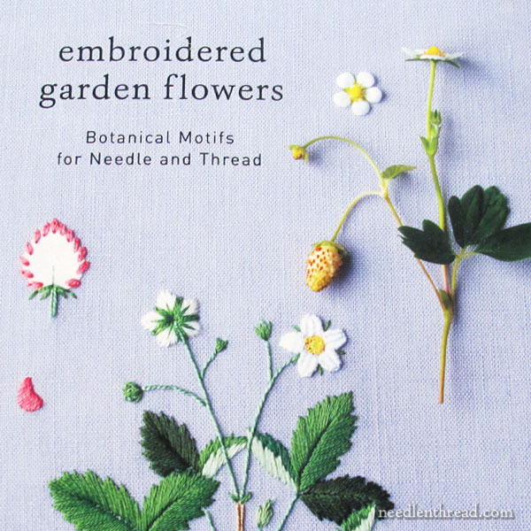 刺繍された庭の花の本
