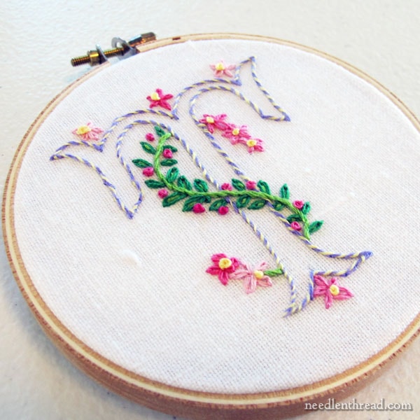 Simple embroidered monograms finished in hoops