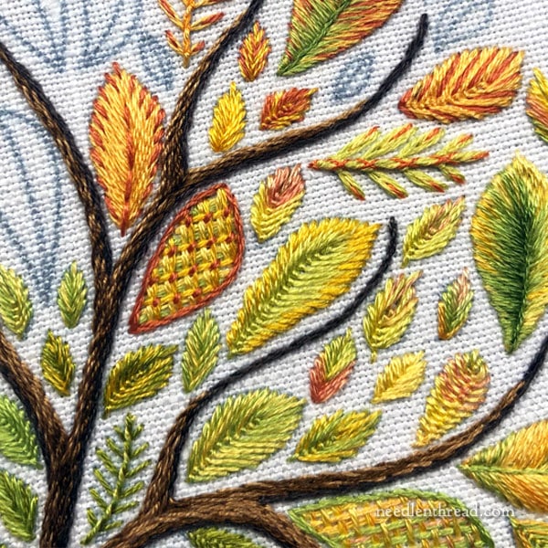 Hand embroidered tree with big leaves
