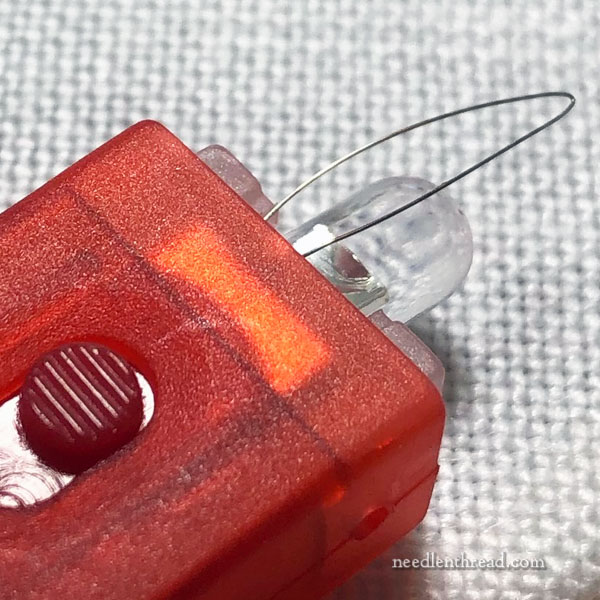 Plastic needle threader with LED light