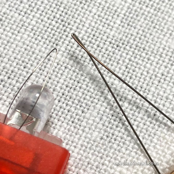 Plastic needle threader with LED light