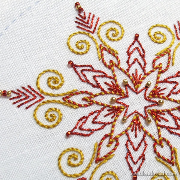 Embroidered Snowflake in blue metallics with beads and crystal