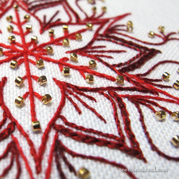 Testing embroidery ideas on snowflakes