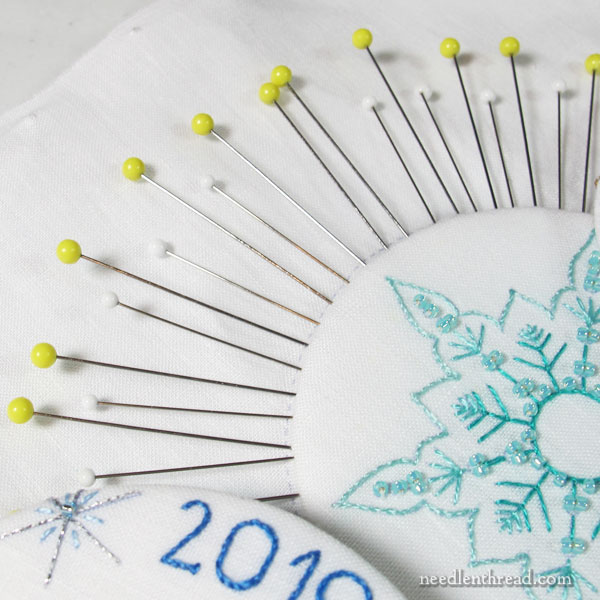 Finishing embroidery into ornaments - tools
