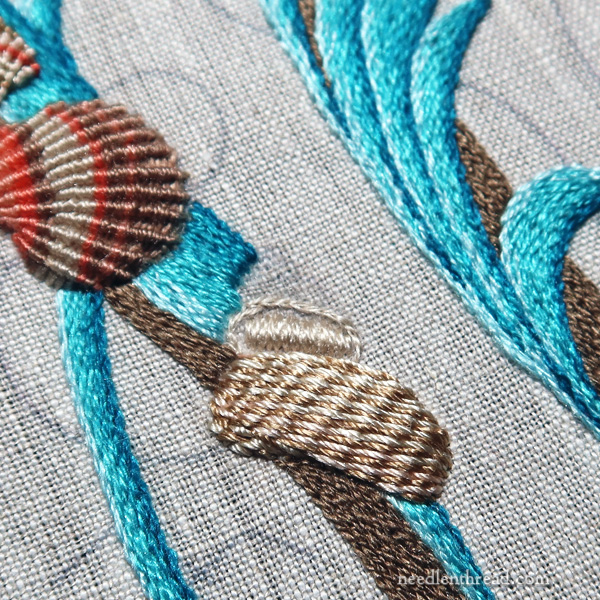 Embroidering a striped seashell