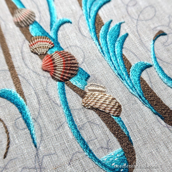 Embroidering a striped seashell