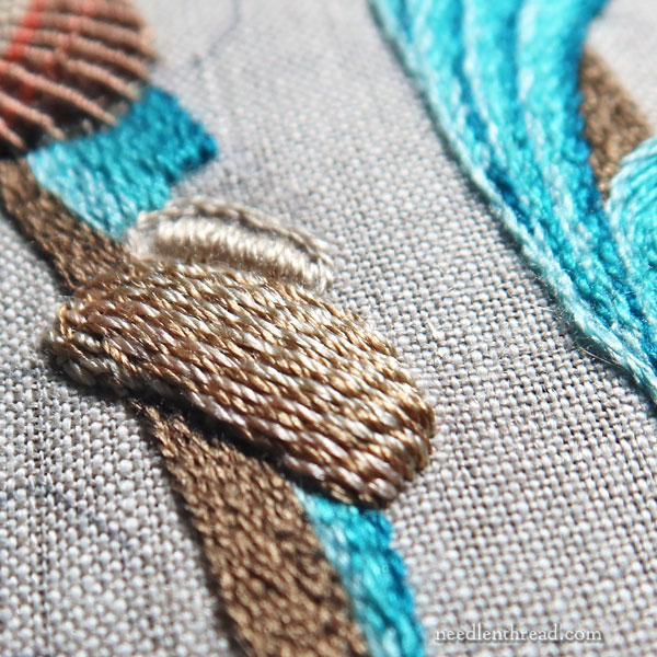 Embroidering a striped seashell