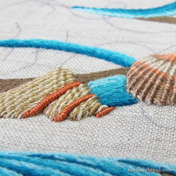 Embroidered monogram M with seashells