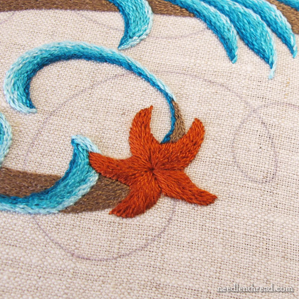 Embroidered monogram M with seashells