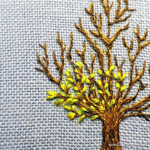 small tree on blue linen