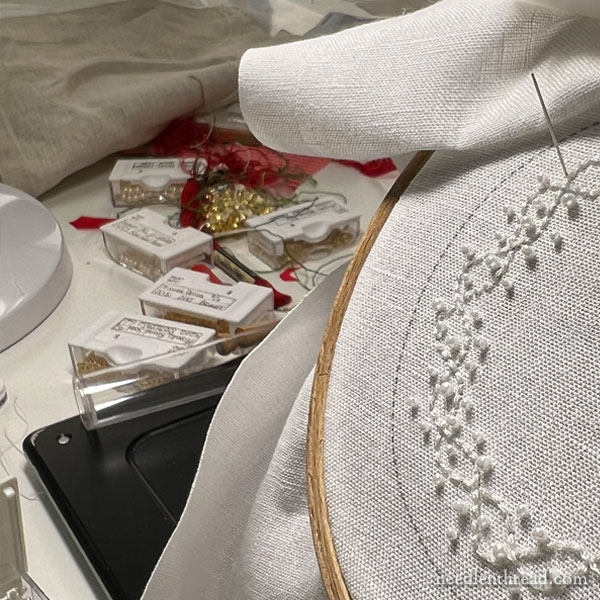 White embroidery with white beads and sparkle