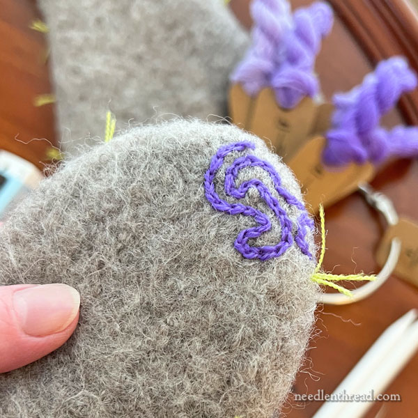 Embroidering Felted Mittens