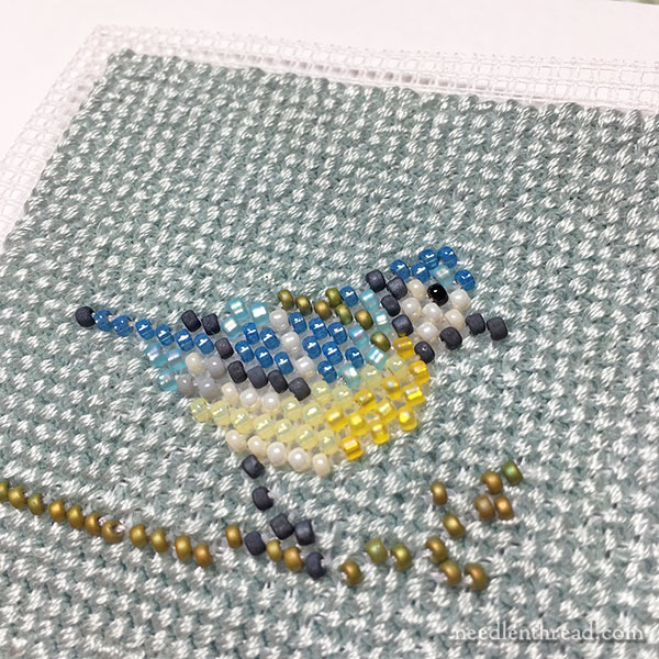 Bead embroidered bird